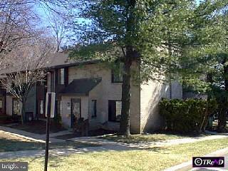 a view of house with tree s