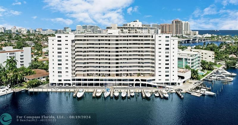 a view of a water with tall building