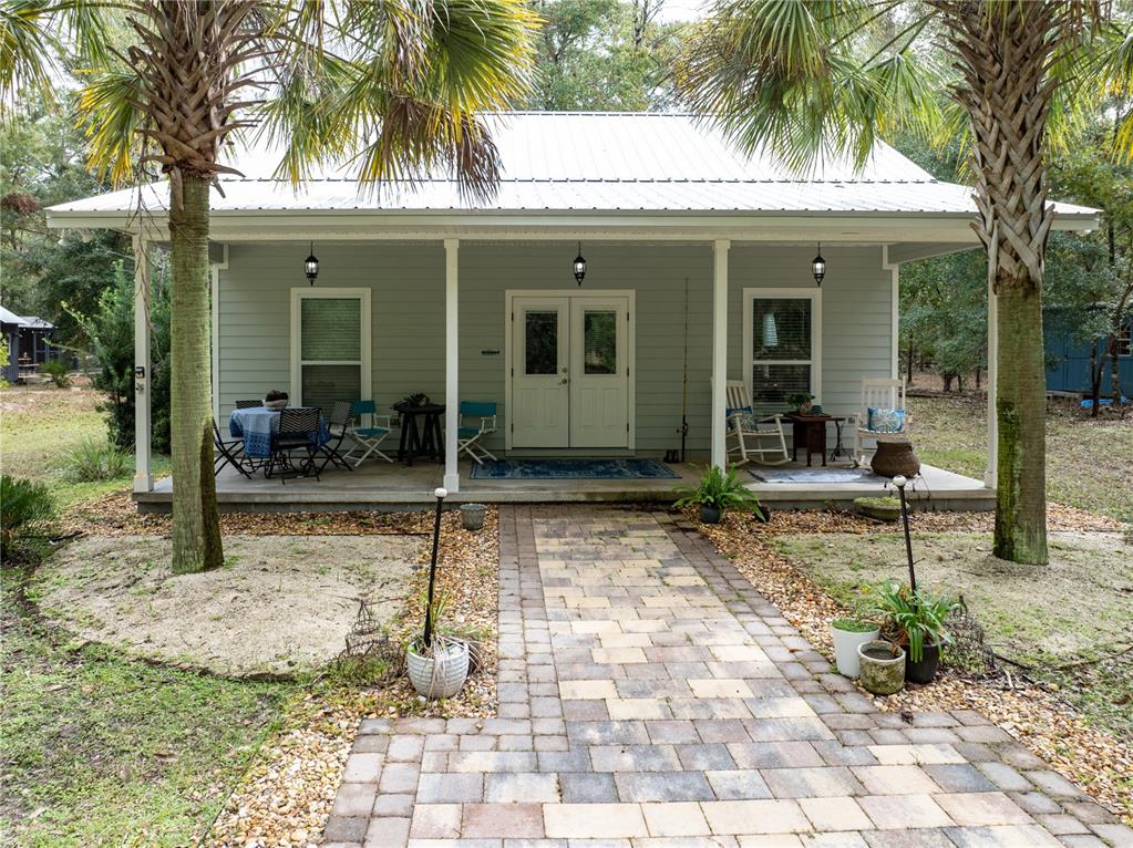 a view of a house with a patio