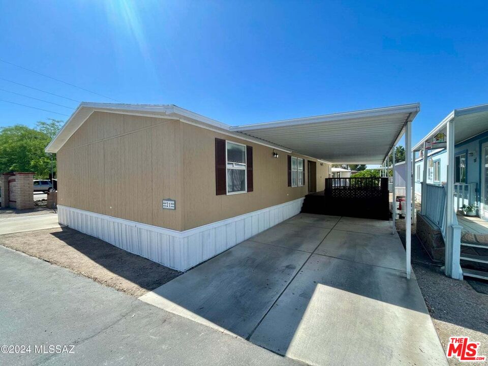 a front view of a house with a garage