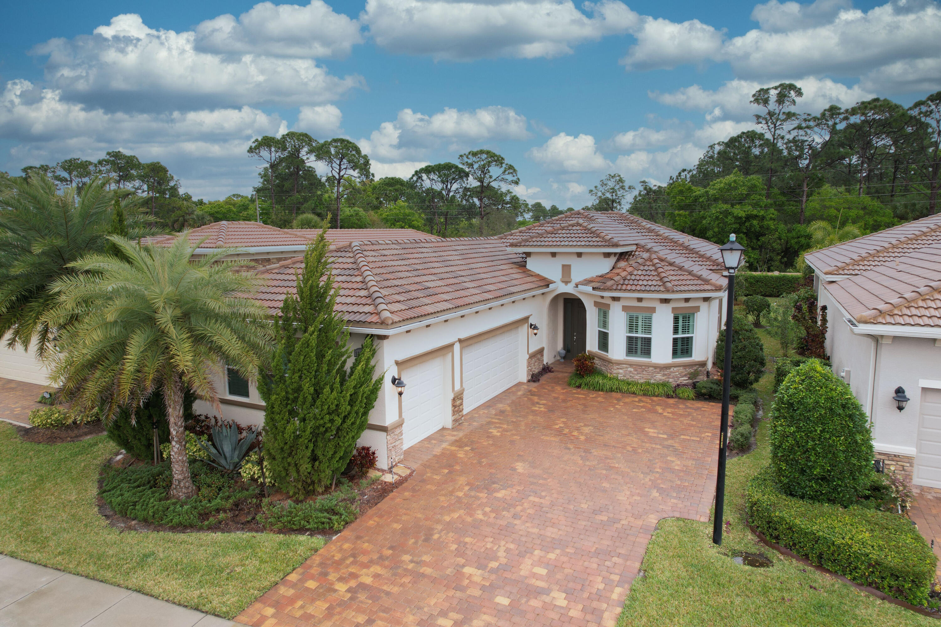 a aerial view of a house with a yard