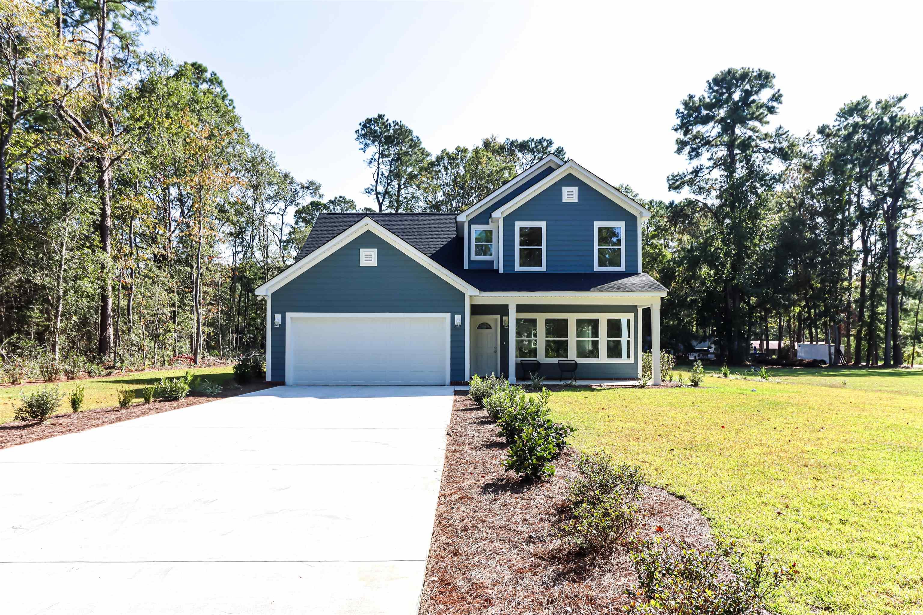 View of front facade with a front lawn