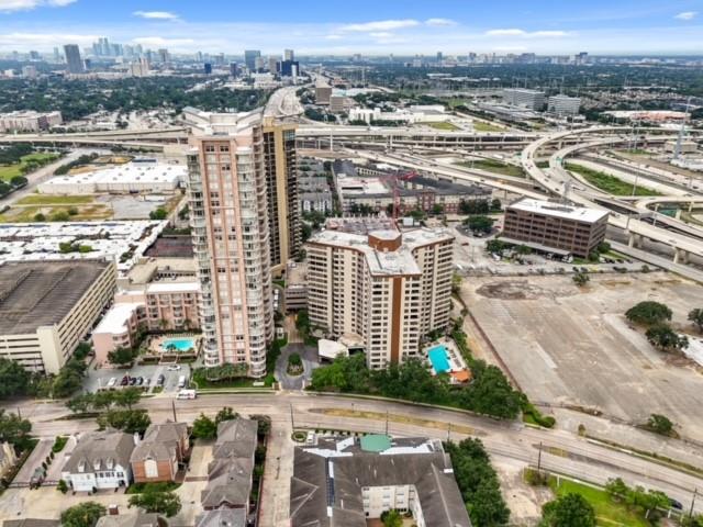 an aerial view of residential building and ocean view