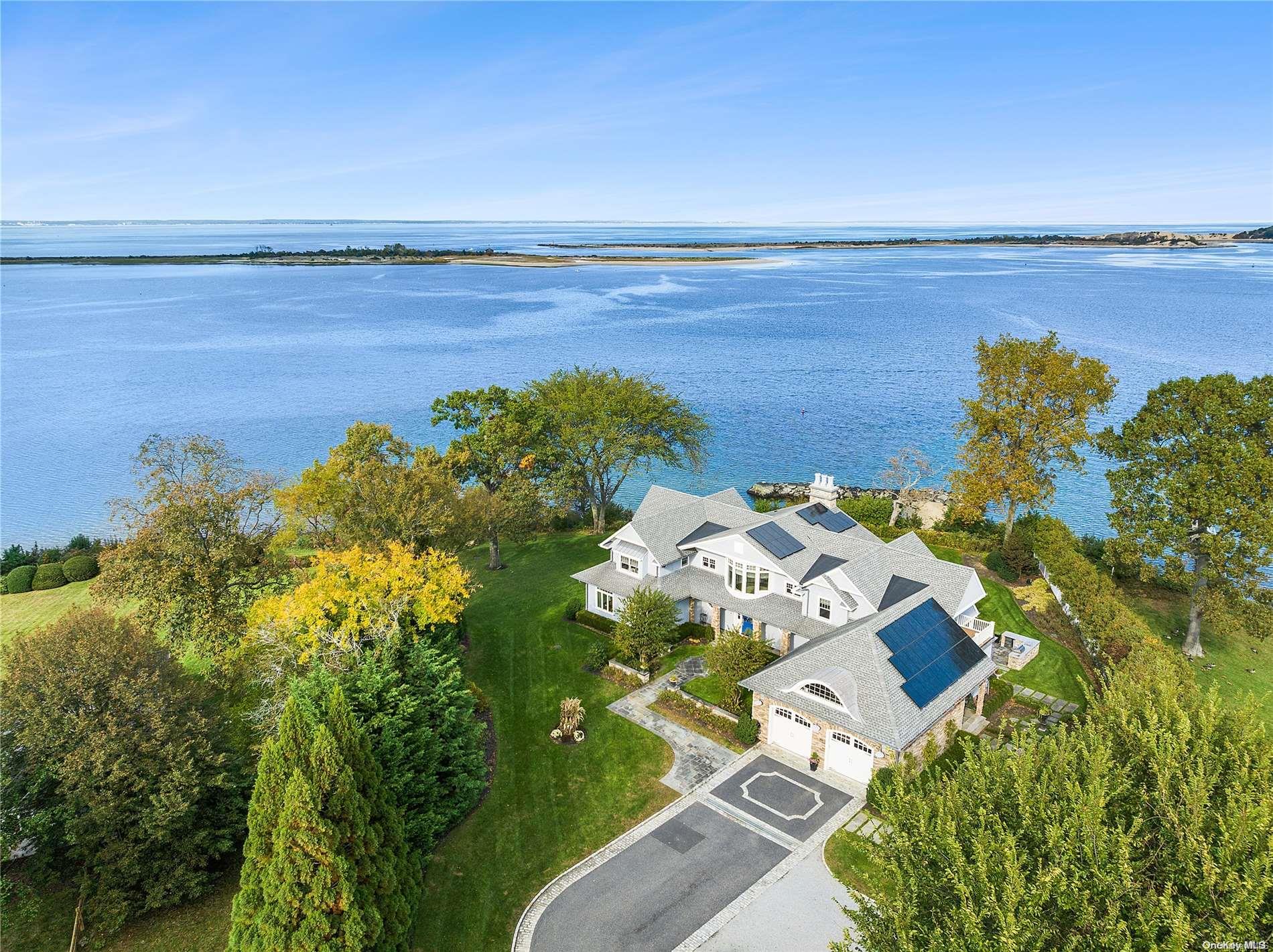 a view of a lake with a yard