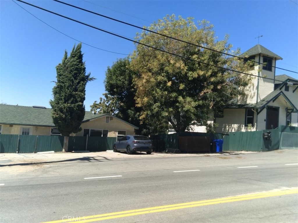 a view of a building with a street