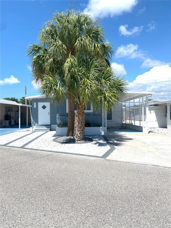 a house with trees in front of it