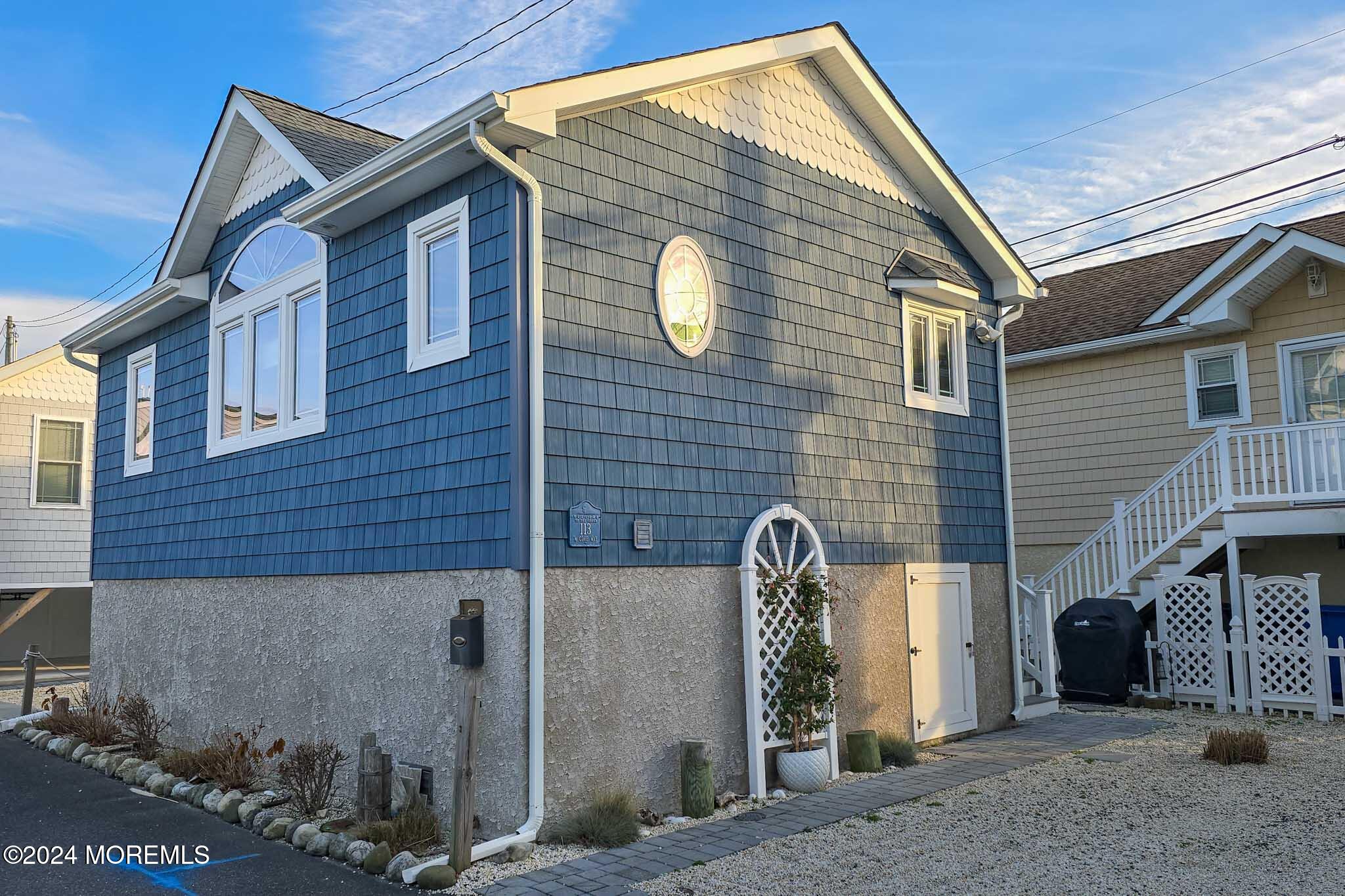 a front view of a house with parking