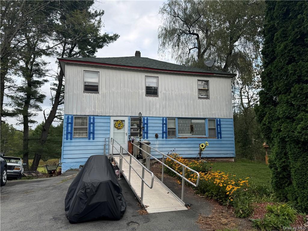 a view of a house with a patio