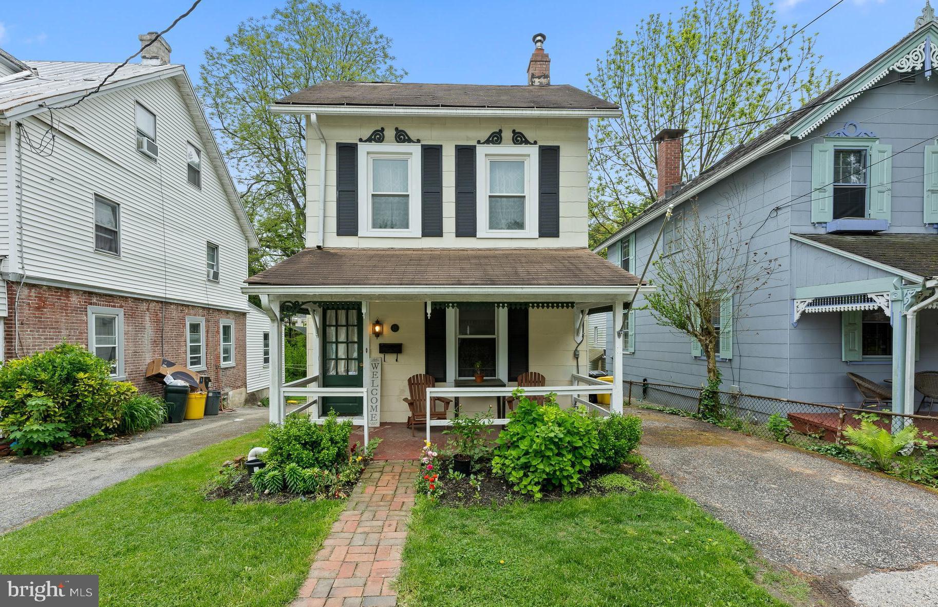 front view of a house with a yard