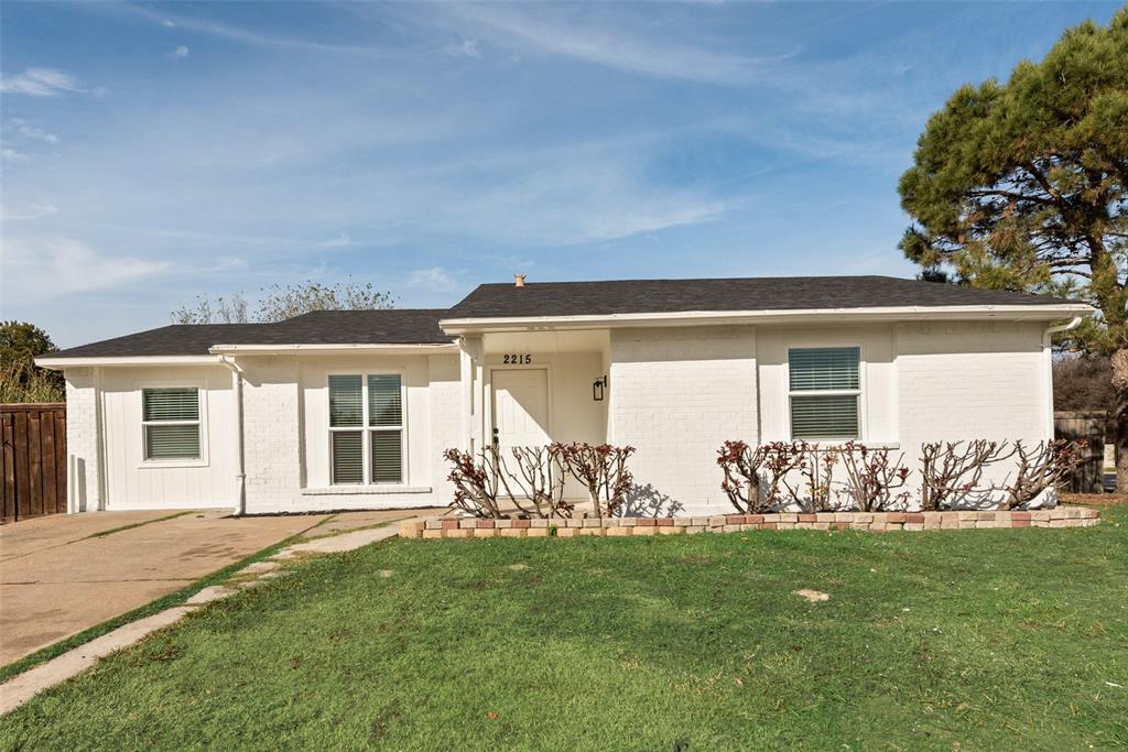 front view of a house with yard