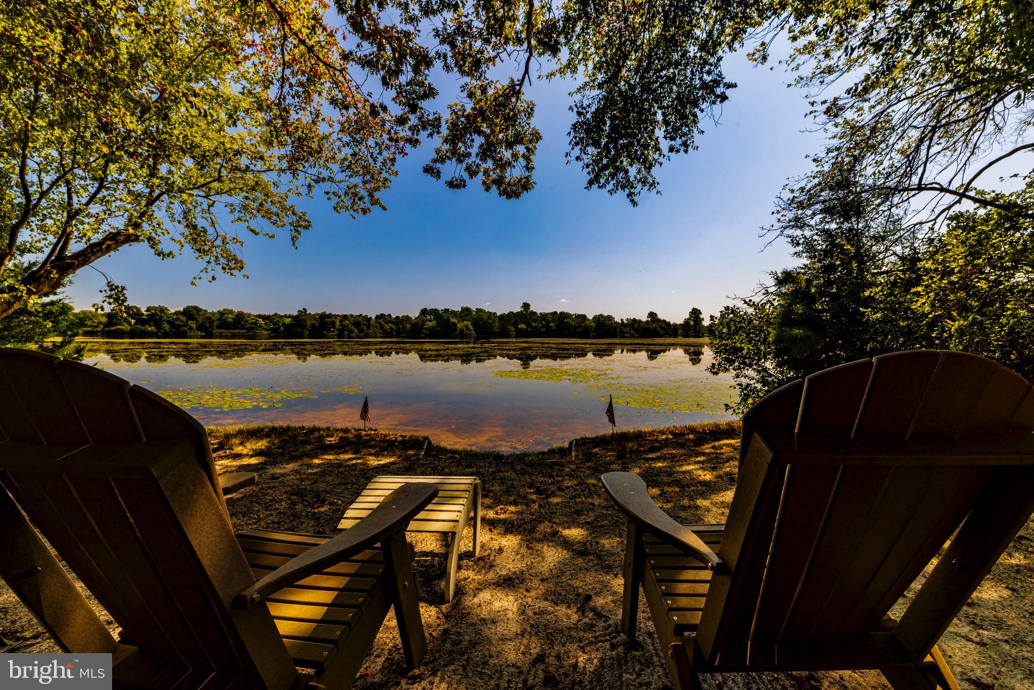 a view of a lake with a outdoor space