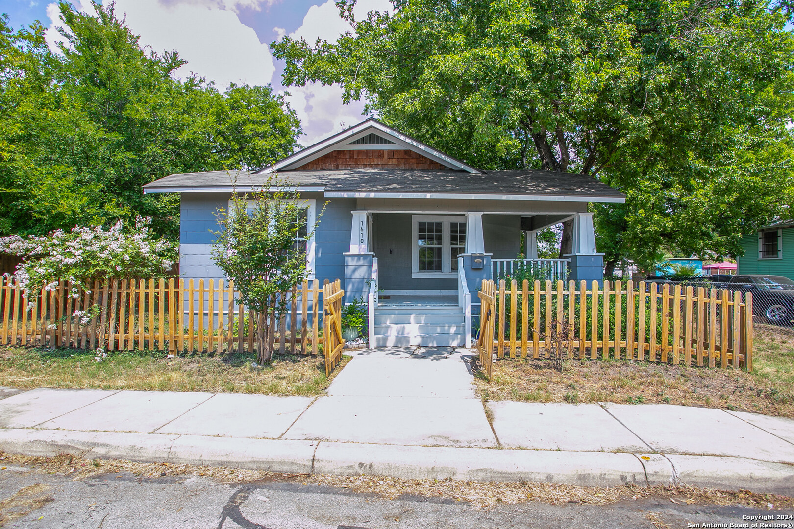 a front view of a house with a porch