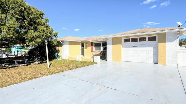 $275,000 | 11200 Meadow Drive | Palm Terrace Gardens