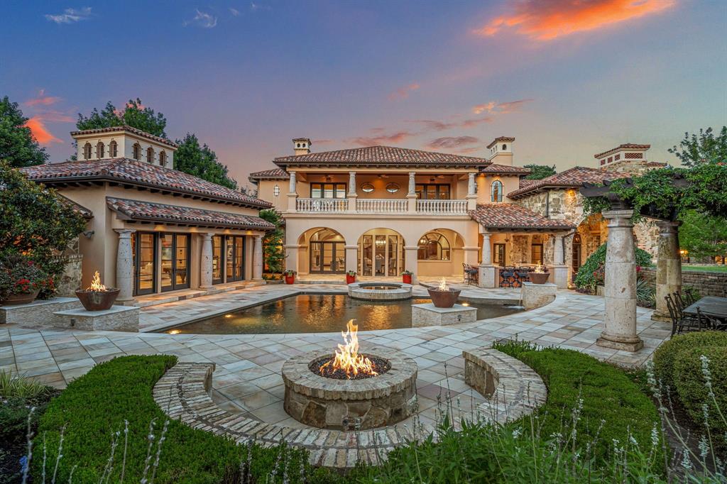 a front view of a house with swimming pool