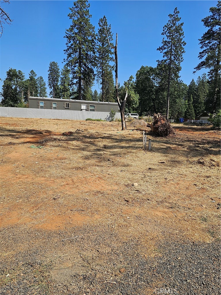 a view of a lake with a yard