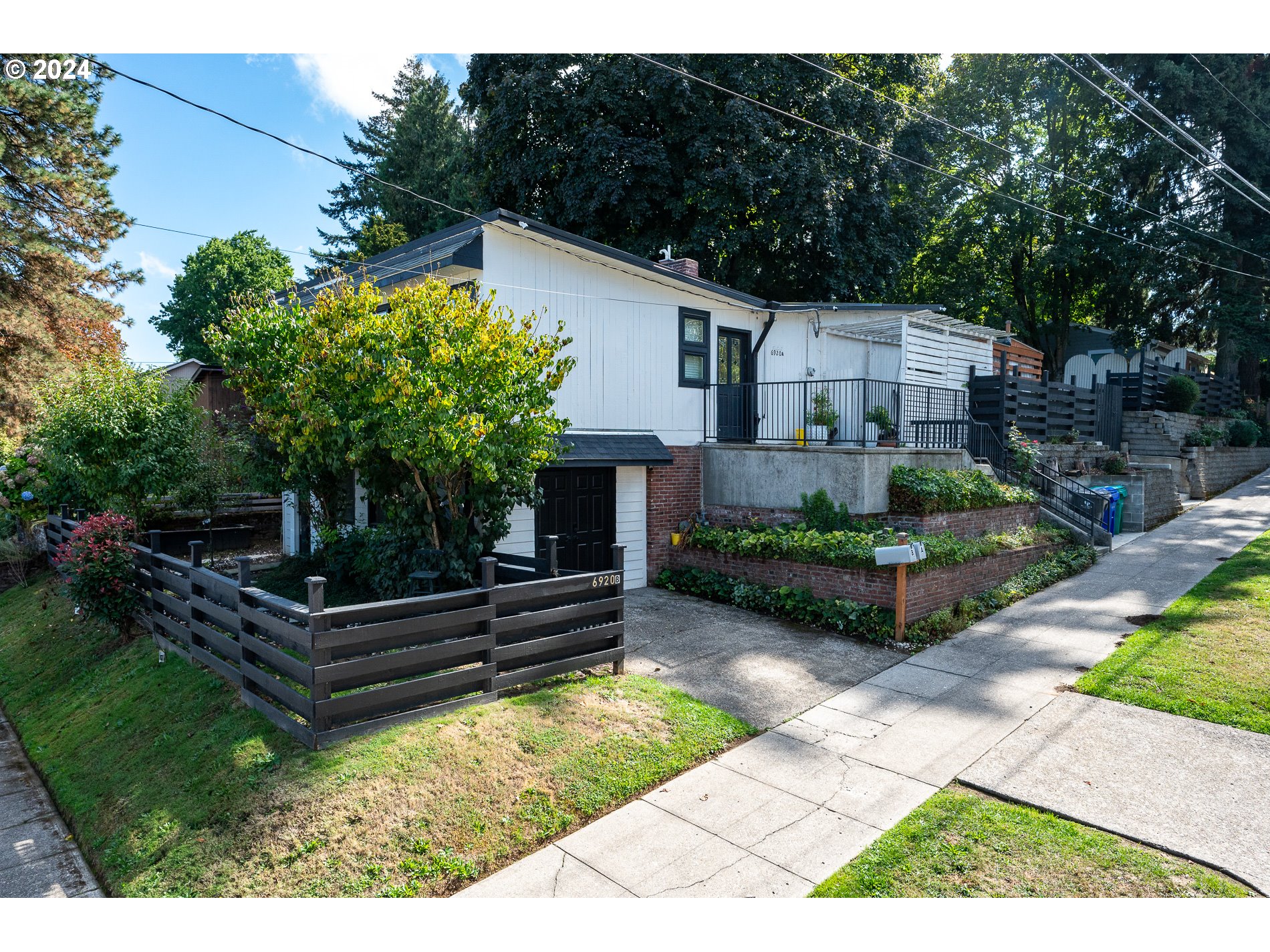 a house view with a garden space