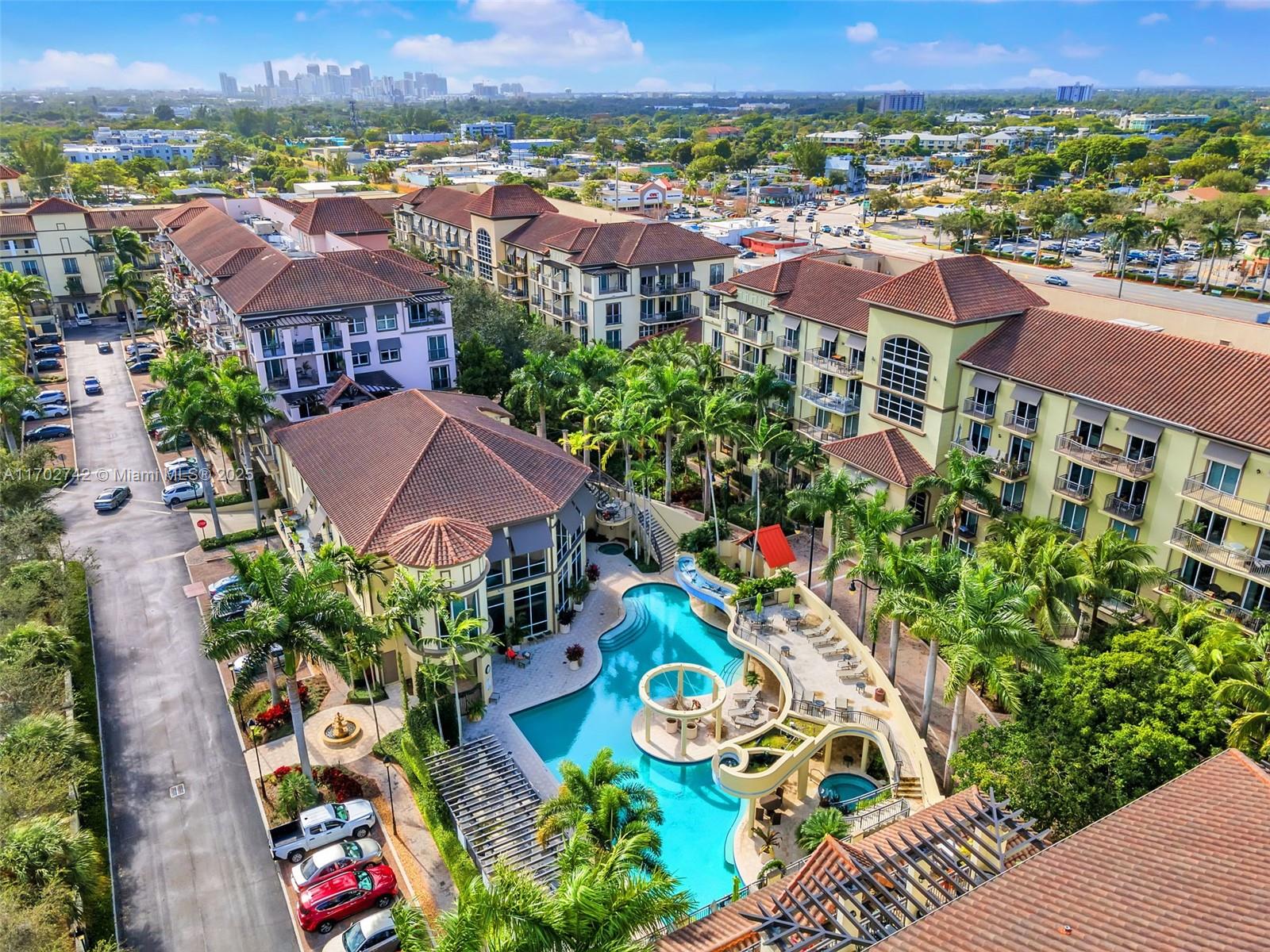 an aerial view of residential houses and outdoor space