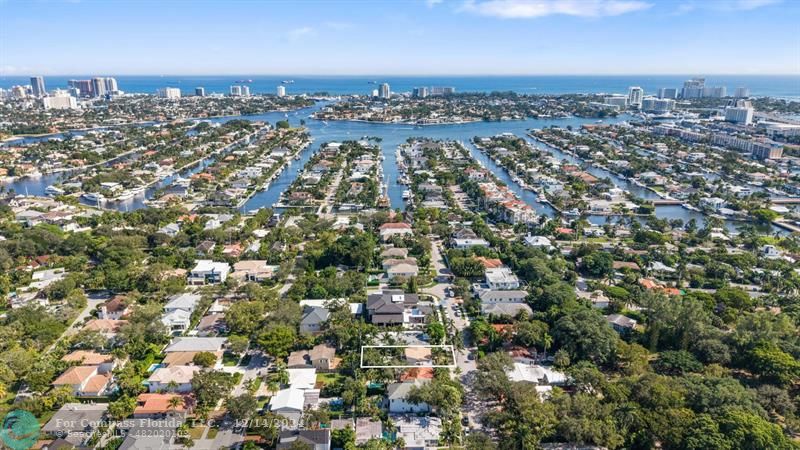 an aerial view of a city with lots of residential buildings