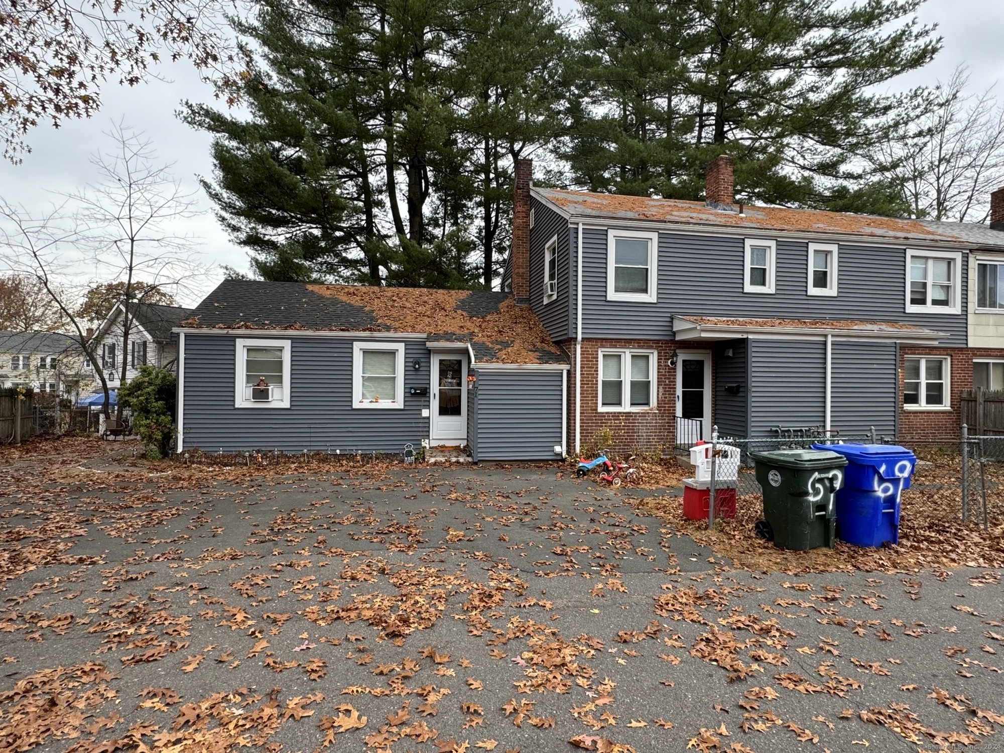 a front view of a house with outdoor space