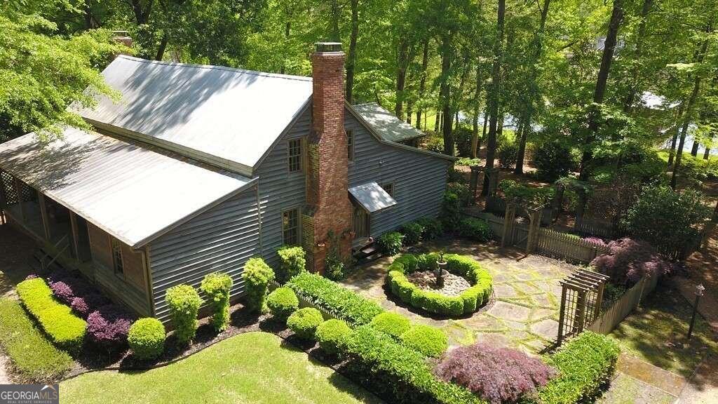 a backyard of a house with lots of green space