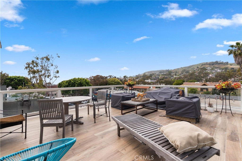 a view of a terrace with furniture