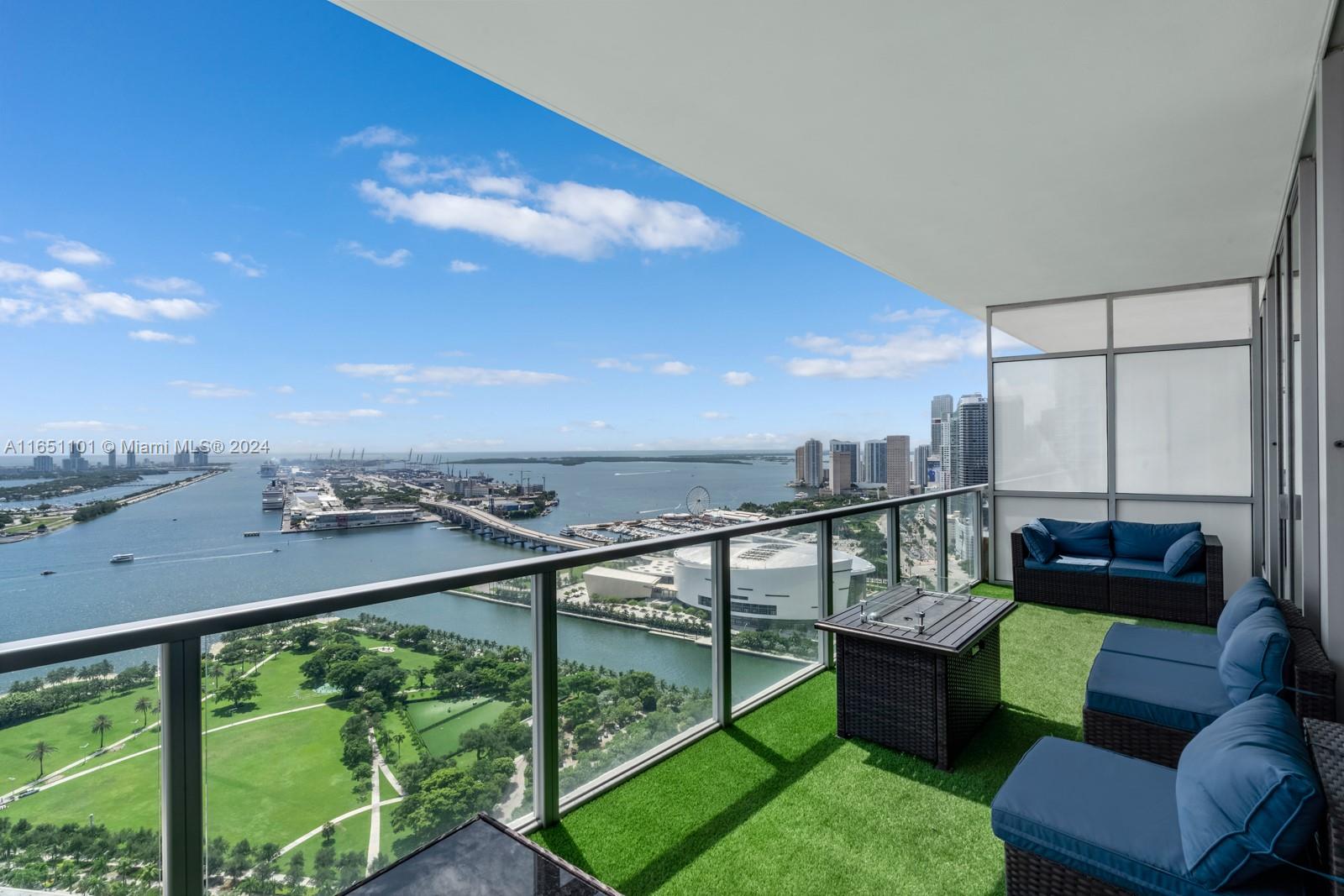 a view of a balcony with furniture