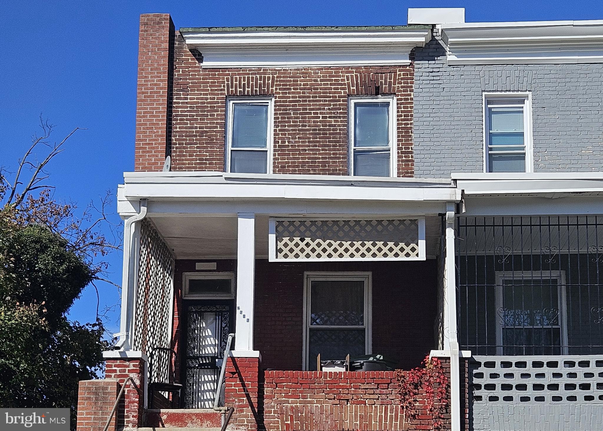 a front view of a house with a balcony