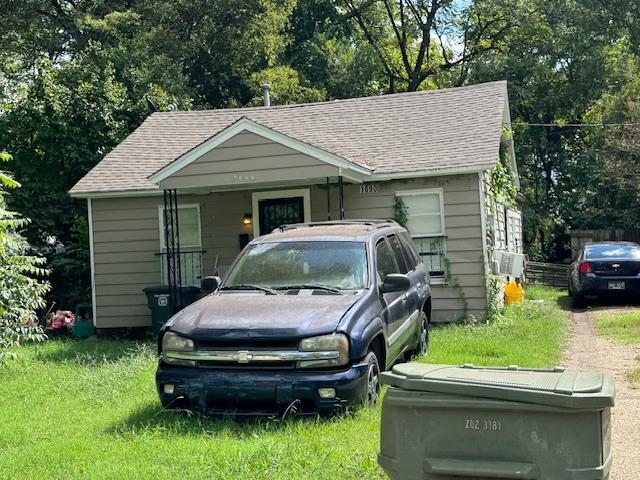 a car parked in front of a house