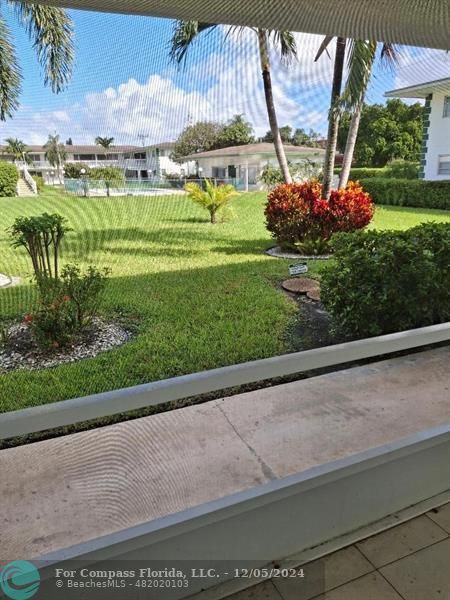 a view of a garden with a big room