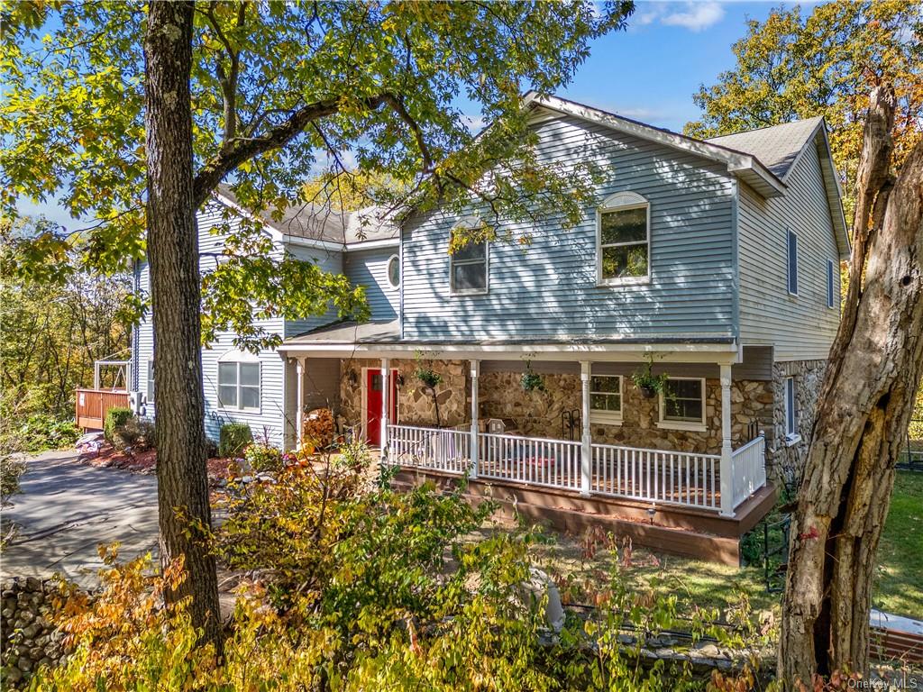 View of front of home with a porch