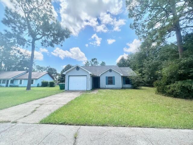 a view of a front of house with a yard