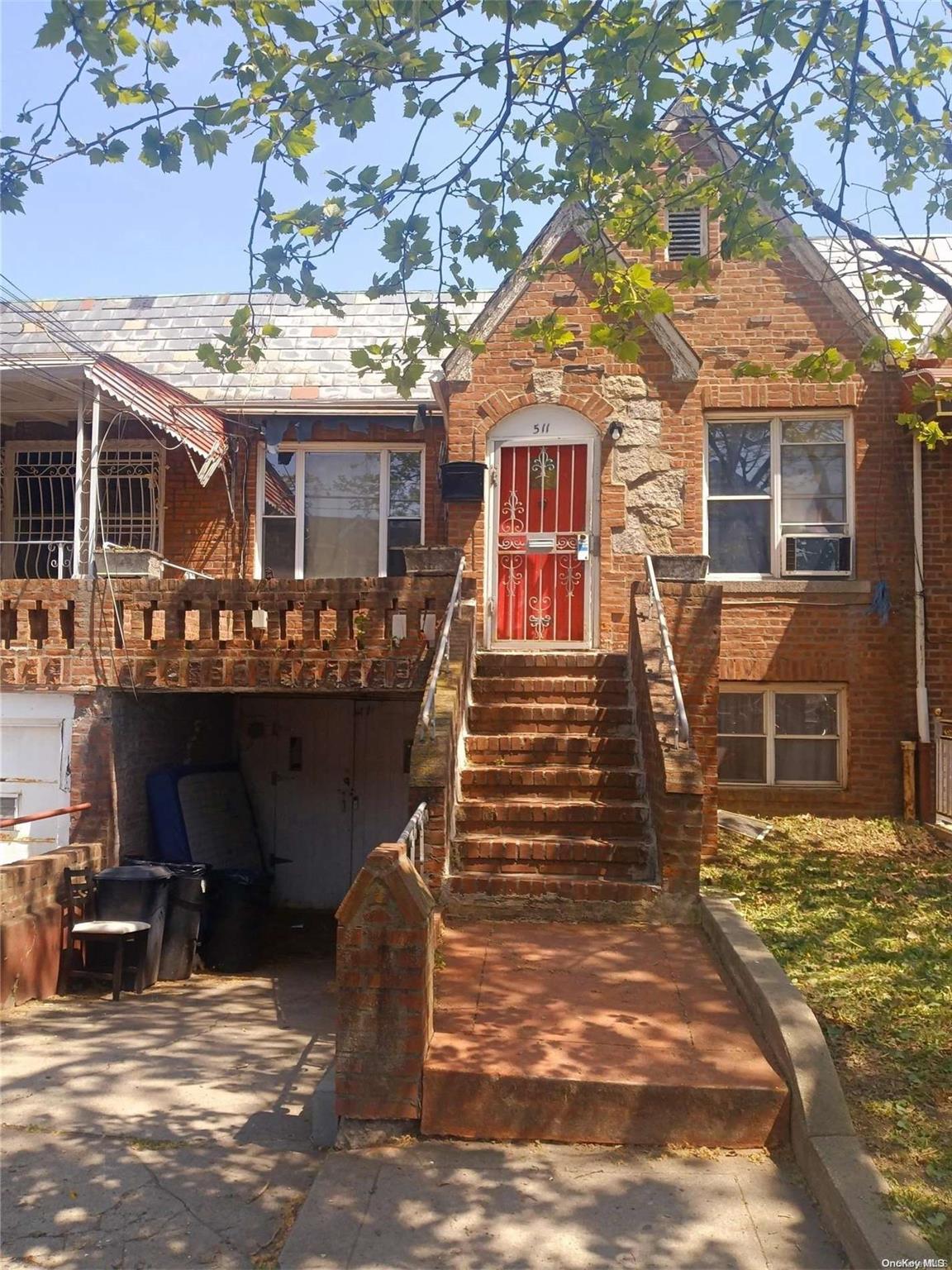 front view of a house with a chairs