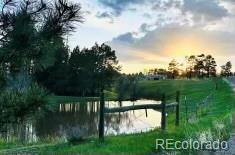 a view of a lake view with a garden