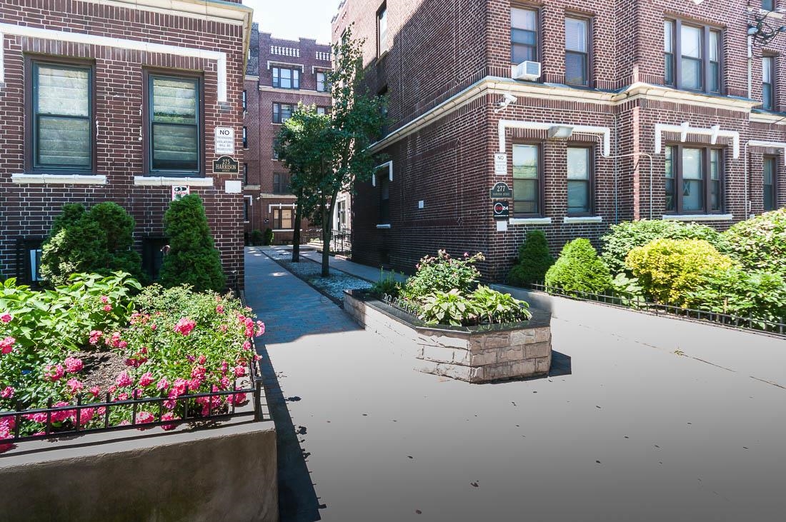 a front view of a multi story residential apartment building