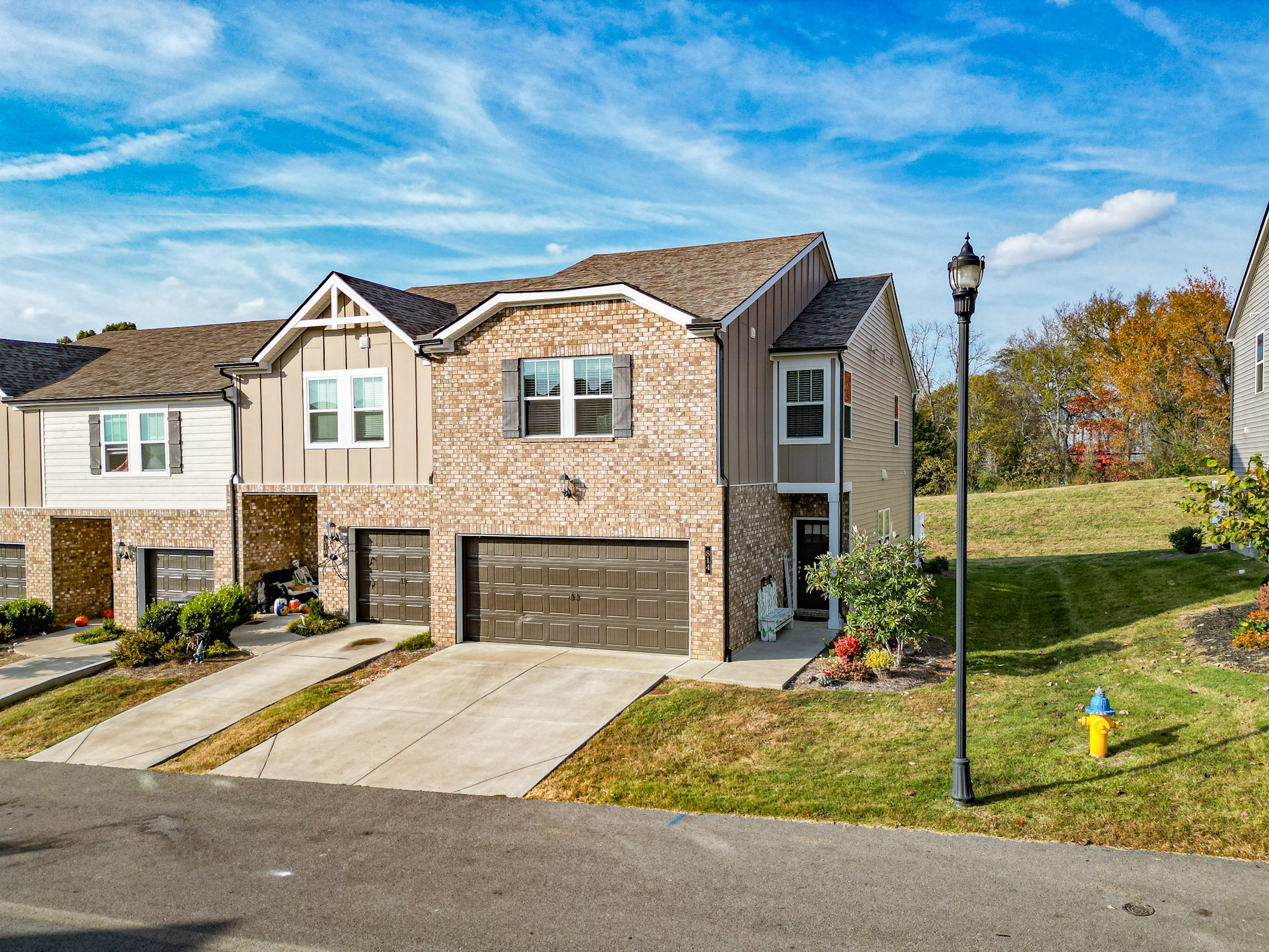 a front view of a house with a yard