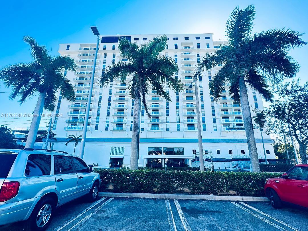 a view of a cars parked in front of a building