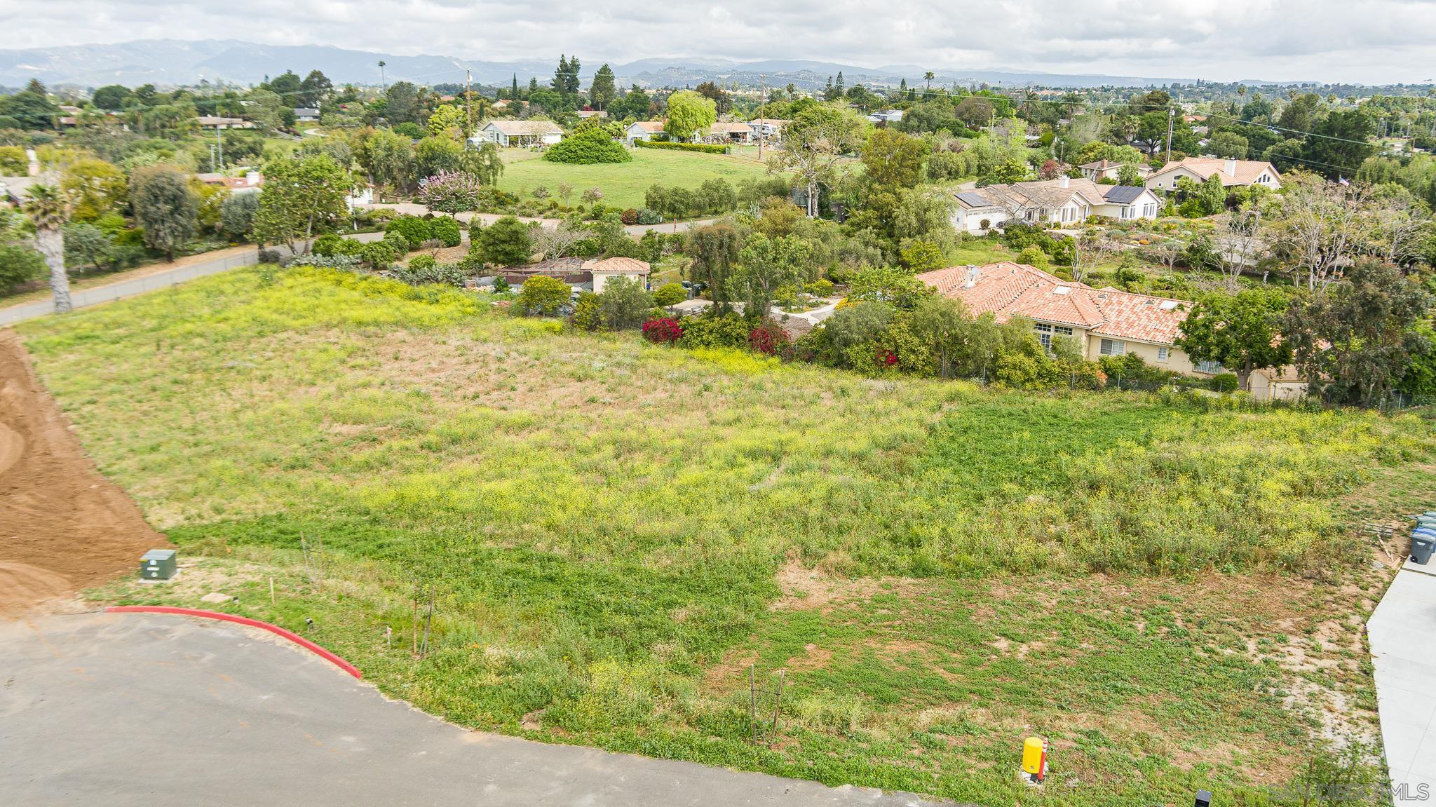 a view of a yard with an outdoor space