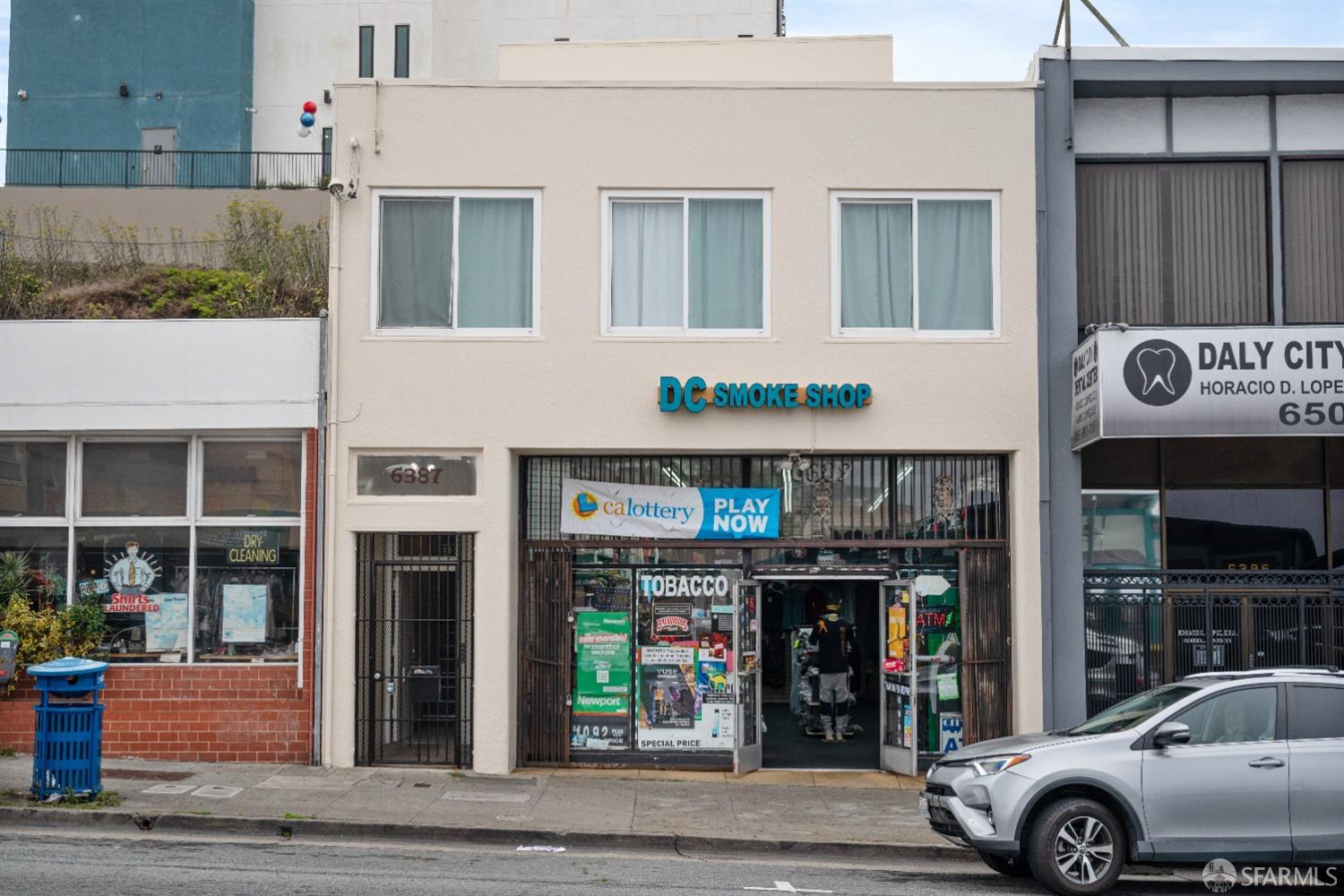 a car parked in front of a building