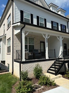 a view of a house with many windows