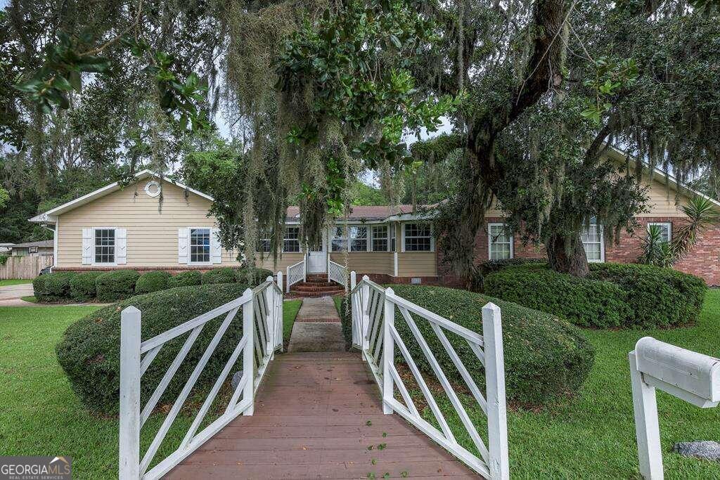 a view of outdoor space and yard