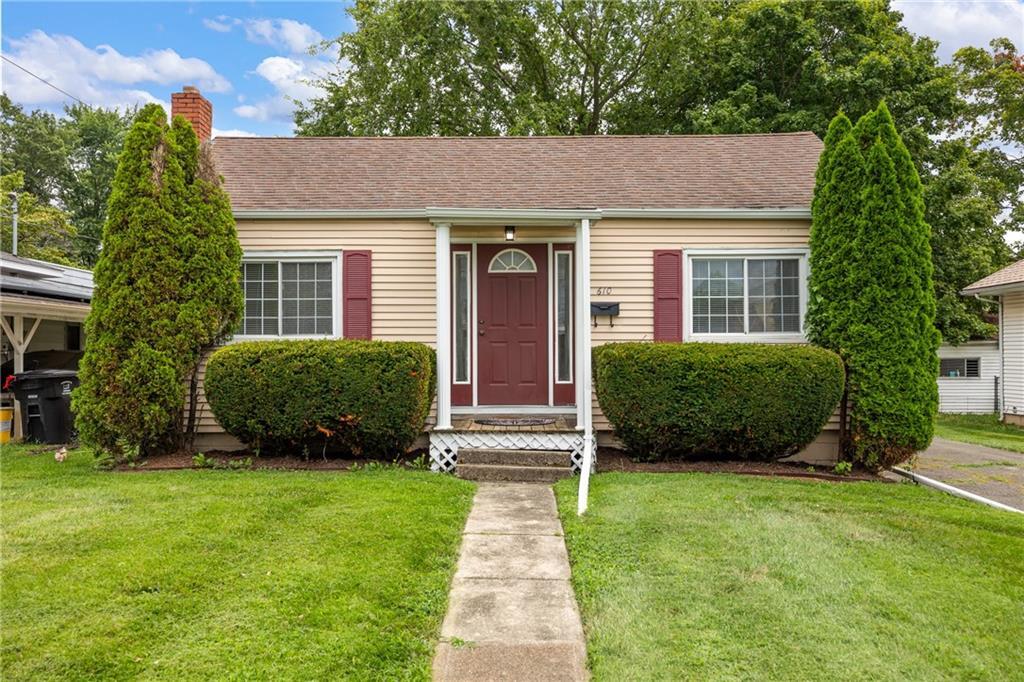 a view of a house with a garden