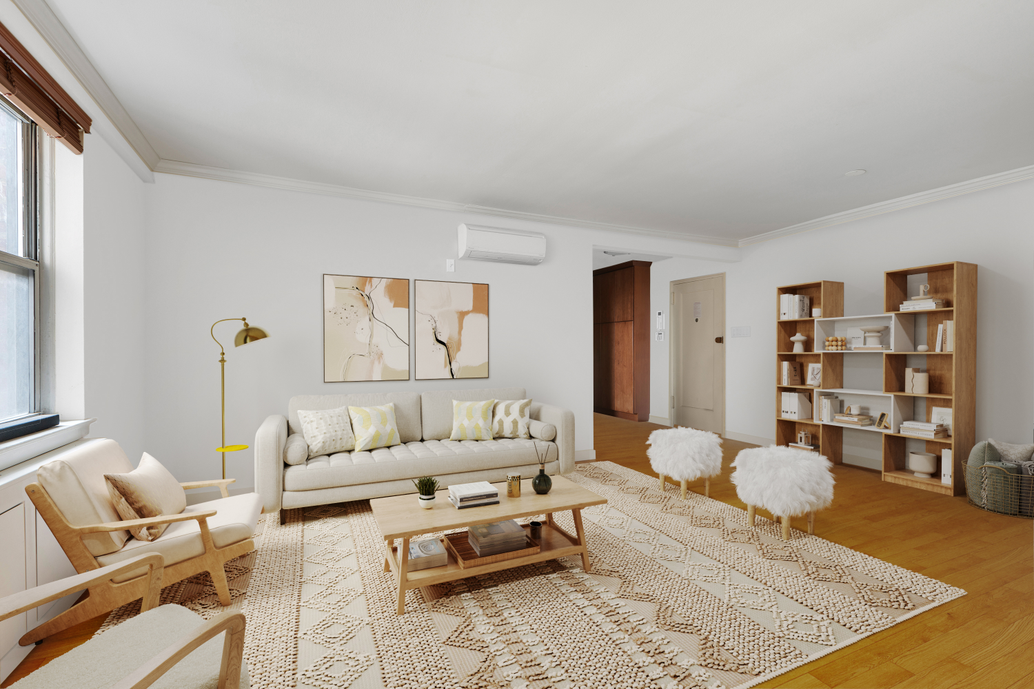 a living room with furniture and a rug