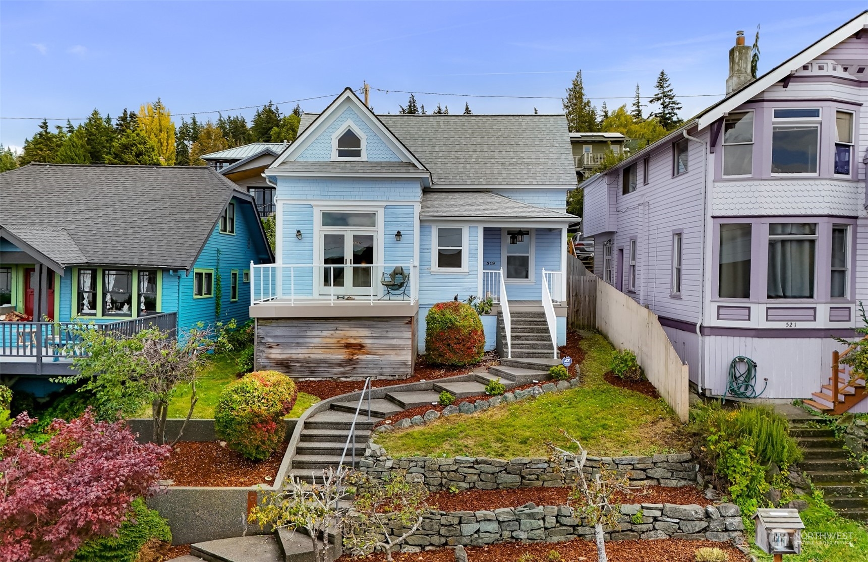 a front view of a house with garden