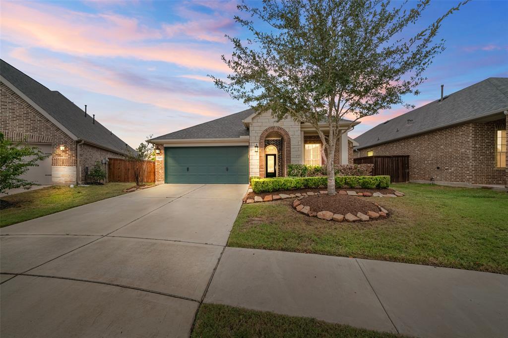 Welcome HOME! 2407 Elmwood Trail, located in the desirable Cane Island neighborhood, offers a lovely layout with 3 bedrooms, 2 full baths, and a two-car attached garage.