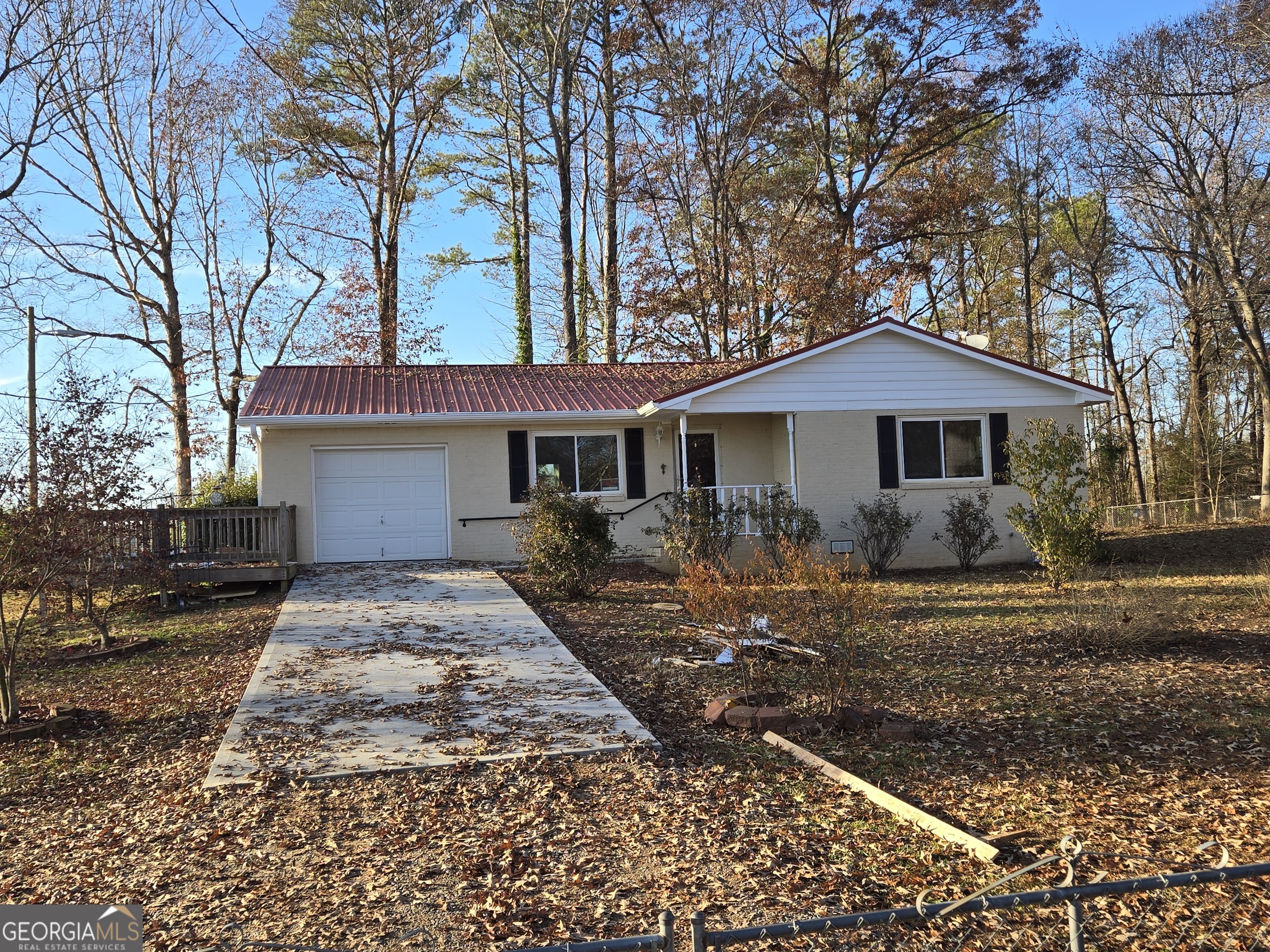 a front view of a house with yard