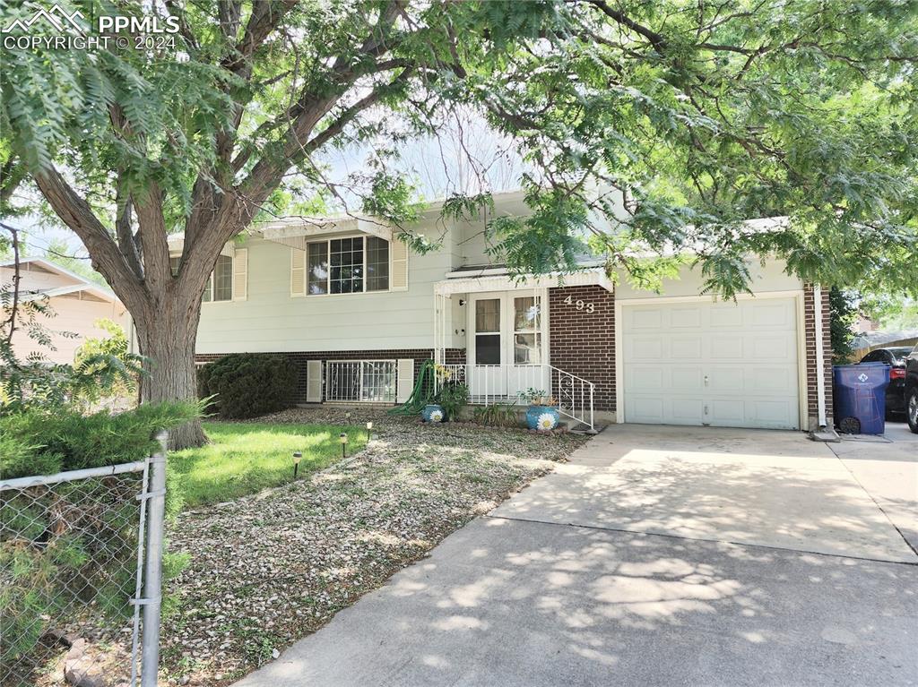 Tri-level home featuring a garage