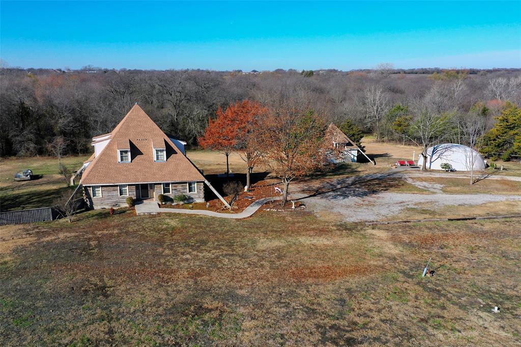 a view of a house with a mountain