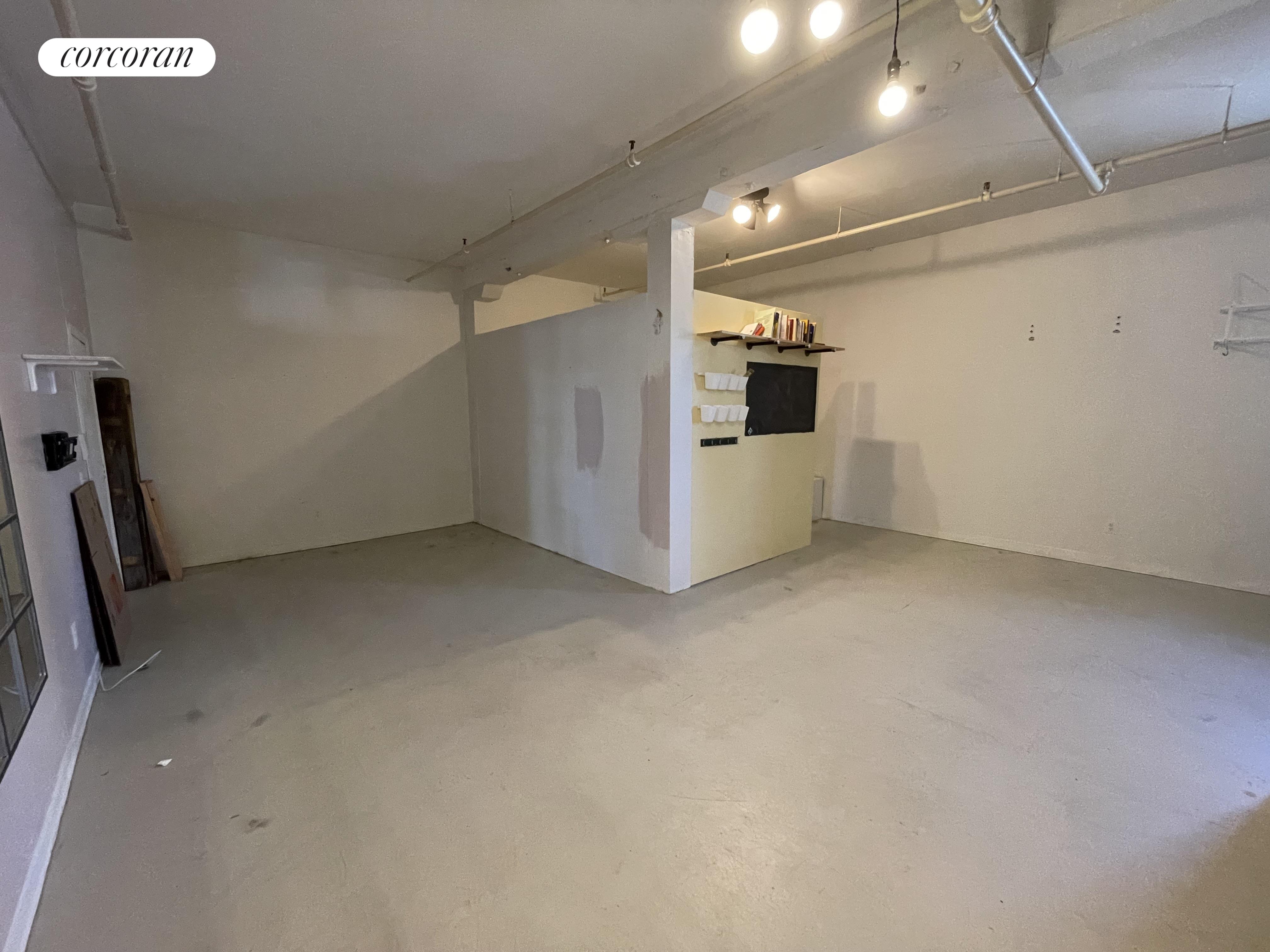 a view of a storage & utility room with closet