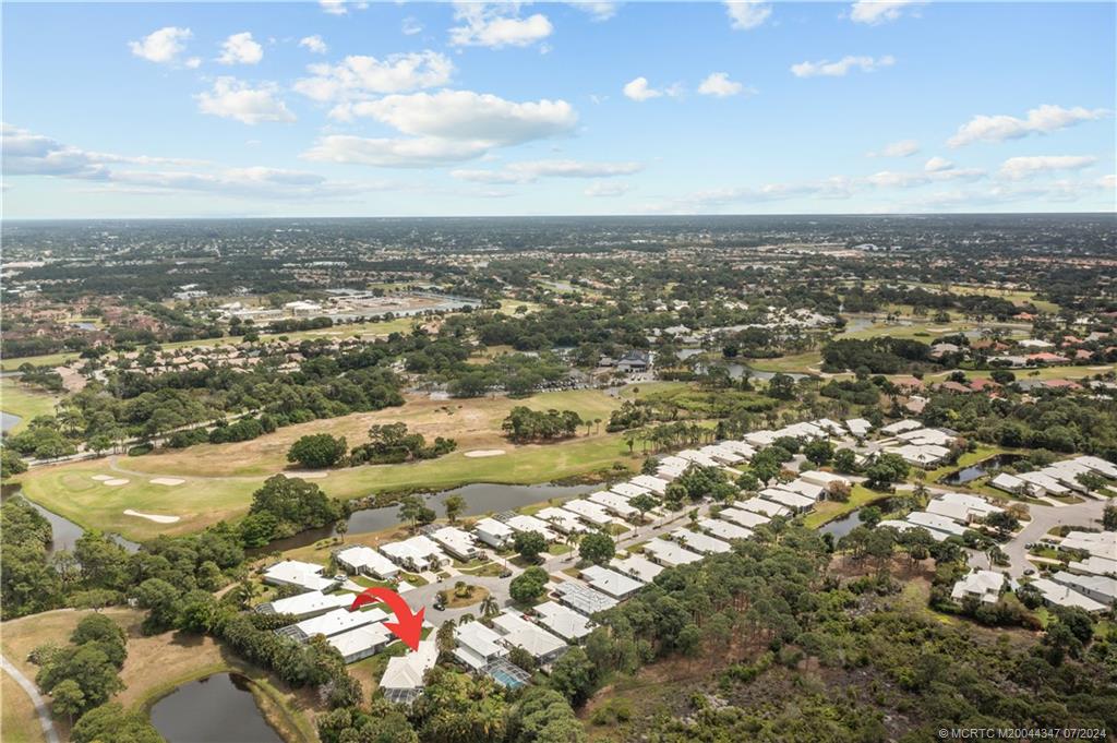 an aerial view of residential building and ocean