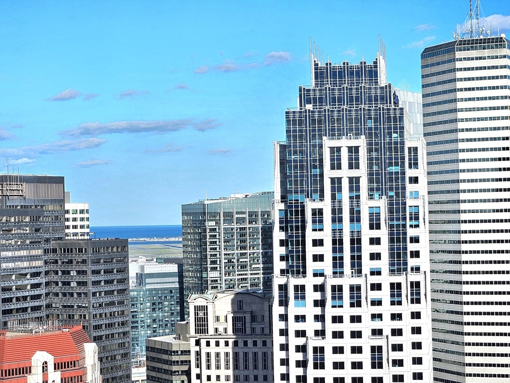 a view of a city with tall buildings